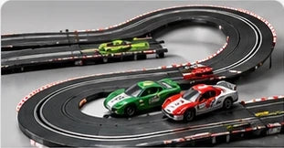 Slot car race sets — illustrative looping racetrack with model cars