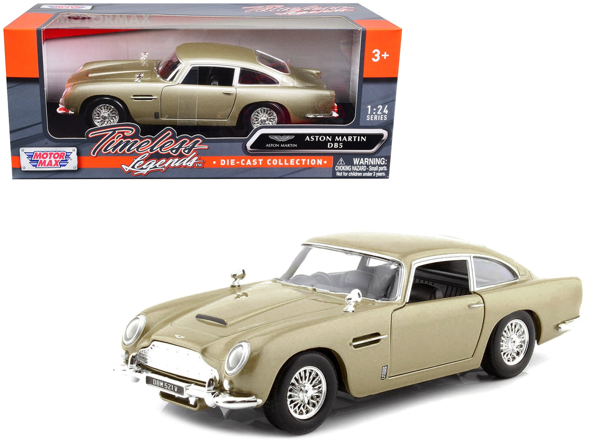 Muncle Mikes collection artwork: gold Motormax Aston Martin DB5 model and retail box