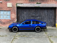 Custom Alfa Romeo GTV6 3.0 blue-and-black car, opposite side view