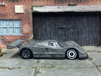 Representative assembled Mazda 787B donor with large rear wing and original wheels