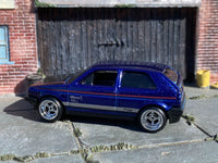 Metallic-blue Volkswagen Golf custom Hot Wheels, right side with KW graphics