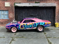 Custom 1969 Dodge Charger Pink Art Car with rubber tires, opposite side view