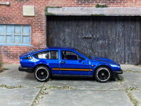 Custom Alfa Romeo GTV6 3.0 in blue and black, front three-quarter view