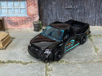 Custom F150 SVT Lightning with rubber tires, rear three-quarter view