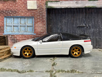 Pearl-white Subaru SVX custom Matchbox, right side with gloss-black greenhouse