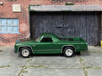 Custom Matchbox 1970 Chevy El Camino green-and-black car, opposite side view