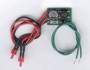 Miniatronics 100-002-01 circuit board with two red LEDs and attached connection wires.