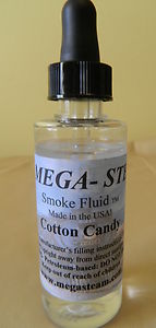 JT's Mega-Steam 136 Cotton Candy Smoke Fluid 2 oz actual labeled glass bottle photograph 1