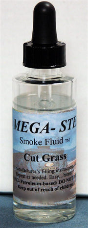 JT's Mega-Steam 138 Cut Grass Smoke Fluid 2 oz actual labeled glass bottle photograph 1