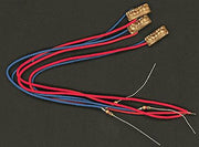 Three Miniatronics 100-408-03 LED chase light-bar boards with attached wires and resistors.