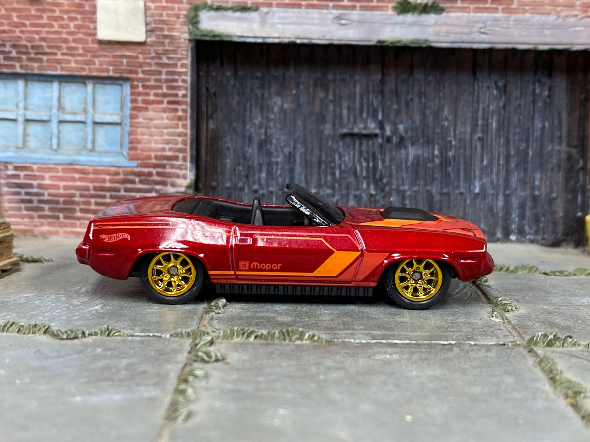 Red-and-orange Plymouth Barracuda custom Hot Wheels, front three-quarter view