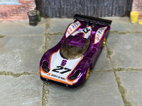 Porsche 911 GTI-98 custom with rubber tires, rear three-quarter view