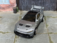 Ford Mustang GTD custom with rubber tires, rear three-quarter view