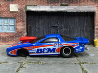 Blue, red and white Pro Stock Firebird custom, left-side view