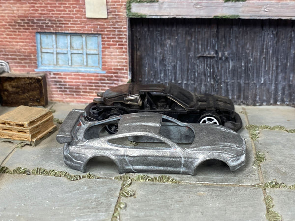 Disassembled 2018 Ford Mustang GT DIY kit with stripped body and components