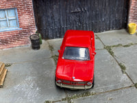 Red 1969 BMW 2002 custom Matchbox, front view with silver grille and headlight trim