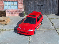 Red Honda Civic EF custom Hot Wheels, front view with silver headlamps