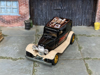 1930 Ford Model A custom with rubber tires, rear three-quarter view
