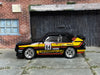 Custom Hot Wheels - 1984 Audi Sport Quatro - Black, Yellow and Red - Chrome 4 Spoke Wheels - Rubber Tires