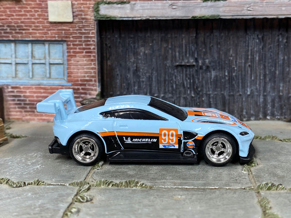 Custom Aston Martin Vantage GTE in blue Gulf-style graphics, front three-quarter view