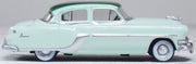 Oxford 87PC54005 1954 Pontiac Chieftain 4-Door Sedan, Shannon Green/Brookmere Green, 1:87 scale, passenger-side profile