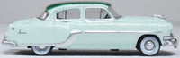 Oxford 87PC54005 1954 Pontiac Chieftain 4-Door Sedan, Shannon Green/Brookmere Green, 1:87 scale, passenger-side profile