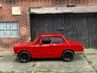 Red 1969 BMW 2002 custom Matchbox, right side with silver bumpers