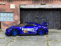Blue LB Silhouette Nissan 35GT-RR custom car, opposite side view