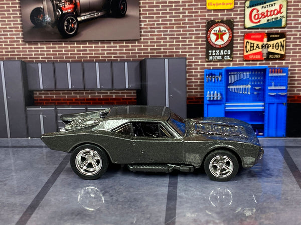 Gunmetal-gray Gotham Batmobile custom Hot Wheels, left side with chrome AMR wheels