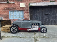Representative assembled Max Steel Hot Rod donor with exposed engine and staggered wheels