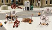 Woodland Scenics A2762 Road Crew Details in a manufacturer O-scale layout example; surrounding buildings, vehicles and other scenery are not included.