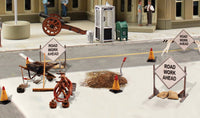 Woodland Scenics A2762 Road Crew Details in a manufacturer O-scale layout example; surrounding buildings, vehicles and other scenery are not included.