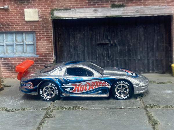 Silver Olds Aurora GTS-1 custom with Falken tires, right-side view
