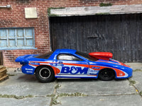 Blue B&M Pro Stock Firebird custom drag car, right-side view