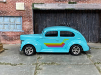 Light-blue Ford Fat Fender custom car, opposite side view