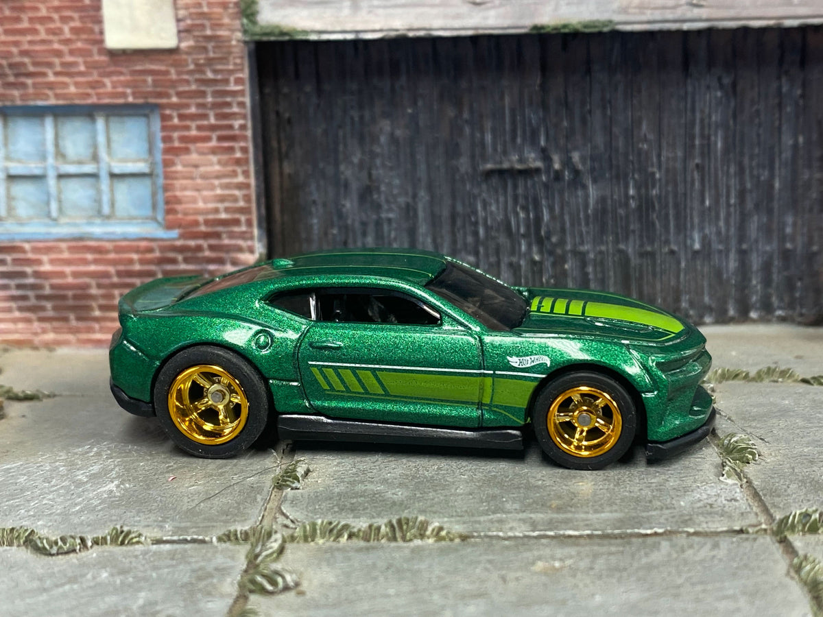 Metallic-green 2018 Camaro SS custom Hot Wheels, left side with gold AMR wheels