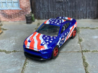Custom 2018 Ford Mustang GT showing star-spangled hood graphics, front three-quarter view