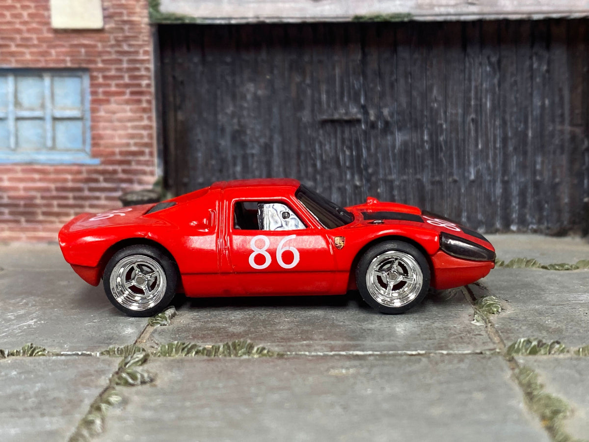Red-and-white Porsche 904 Carrera GTS custom Hot Wheels, front three-quarter view