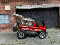 Red Radio Flyer Wagon custom drag car with chrome engine, right-side view
