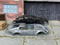 Disassembled El Segundo Coupe DIY kit with stripped body and components