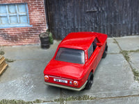 Red 1969 BMW 2002 custom Matchbox, rear view with BMW 2002 plate graphic