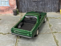 Custom Matchbox 1970 Chevy El Camino with chrome steel-style wheels, side view