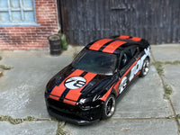 2018 Ford Mustang GT custom showing BORLA number 3 hood graphics, front view