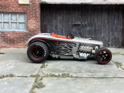 Custom Hot Wheels diecast car with rubber tires, flame decals, and collector-grade painted finish from Muncle Mikes