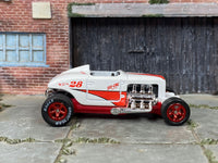Custom Max Steel in white-and-red So Cal graphics, front three-quarter view