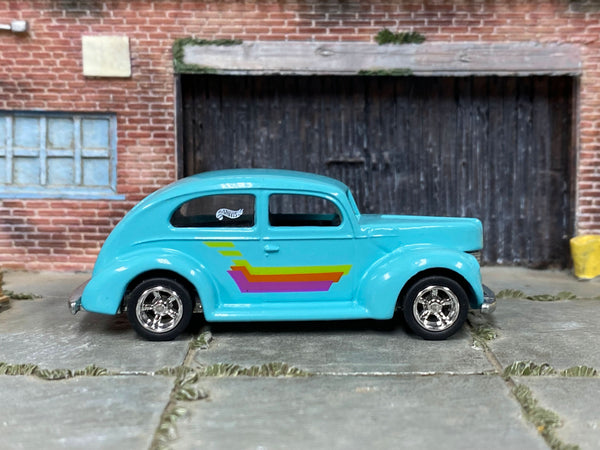 Light-blue 1940 Ford Fat Fender custom Hot Wheels, front three-quarter view