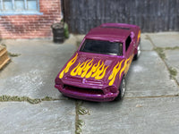Purple custom 1966 Shelby GT 500 showing yellow hood flames, front three-quarter view