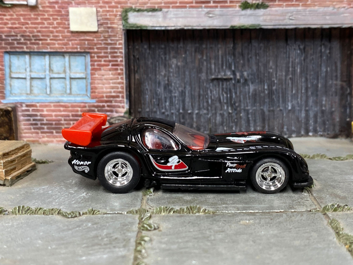 Black-and-red Panoz GTR-1 custom Hot Wheels, front three-quarter view