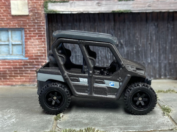 Metallic-gray Kawasaki Teryx4 custom Matchbox, right side with black off-road tires