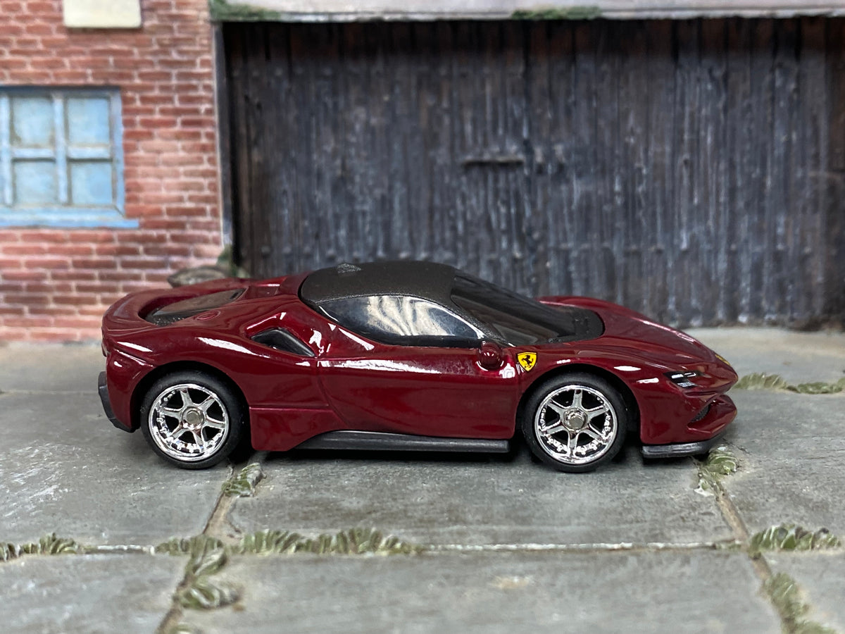 Dark-red custom Hot Wheels Ferrari SF90 Stradale with chrome mag wheels